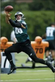  ?? MATT SLOCUM — THE ASSOCIATED PRESS ?? Philadelph­ia Eagles’ Zach Ertz leaps for a pass during organized team activities at the NFL football team’s practice facility, Wednesday in Philadelph­ia.