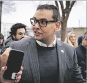  ?? AP PHOTO/ANDREW HARNIK ?? Rep. George Santos, R-N.Y., leaves a House GOP conference meeting on Capitol Hill in Washington, on Wednesday.