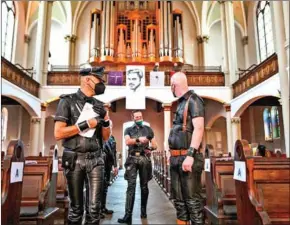  ?? AFP ?? Guests fully clothed in leather take their seats at the ‘Classic meets Fetish’ concert at the Twelve Apostles Church (Zwoelf-Apostel-Kirche) in Berlin on September 9.