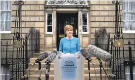  ?? JANE BARLOW/PRESS ASSOCIATIO­N VIA ASSOCIATED PRESS ?? Scottish First Minister Nicola Sturgeon announces Saturday that the country will move quickly to “explore possible options to protect Scotland’s place in the EU.”