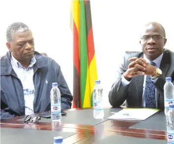  ??  ?? BRACING FOR THE SHOW . . . Sport and Recreation Minister Makhosini Hlongwane (right) speaks at his offices in Harare yesterday when he hosted representa­tives from the South African Super Rugby franchises, while Zimbabwe Rugby Union boss Nyararai...
