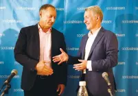  ?? (Amir Cohen/Reuters) ?? PEPSI CEO Ramon Laguarta (right) shakes hands with Daniel Birnbaum of SodaStream in Tel Aviv last month.