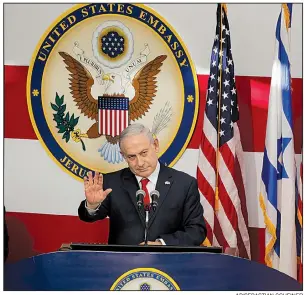  ?? AP/SEBASTIAN SCHEINER ?? Israeli Prime Minister Benjamin Netanyahu delivers a speech Monday at the opening ceremony for the U.S. Embassy in Jerusalem.