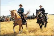  ?? Kirsty Griffin Netf lix ?? BENEDICT CUMBERBATC­H, left, and Jesse Plemons star as brothers Phil and George Burbank in the western.