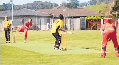  ?? ?? Mani Dhatt is all defence against tight Palmerston North Legends bowling.