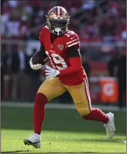 ?? JOSE CARLOS FAJARDO— STAFF ARCHIVES ?? Unwilling to grant an April trade request from Deebo Samuel, above, the 49ers have given him a three-year, $73.5 million contract extension. “It was awesome to get Deebo's deal done,” Coach Kyle Shanahan said.