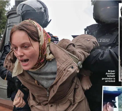  ?? ?? Brave: Another female protester is arrested