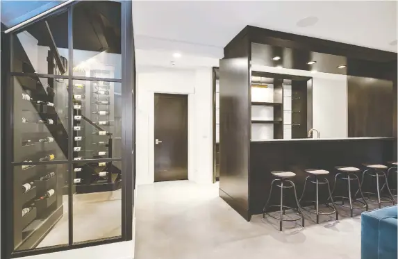  ?? PHOTOS: VERaNDA ESTATE HOMES ?? Inside a wine room where space for storage, display and tasting are of the outmost importance.