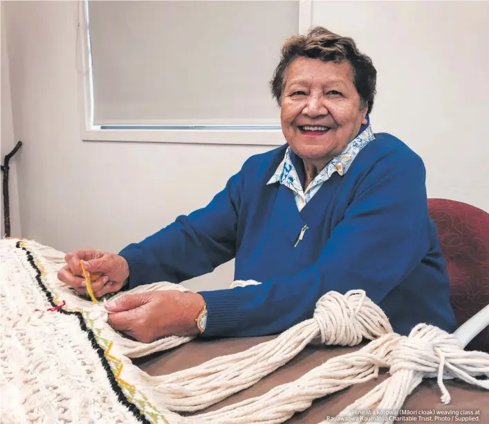  ?? ?? Hine at a korowai (Māori cloak) weaving class at Rauawaawa Kaumātua Charitable Trust. Photo / Supplied.