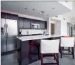  ??  ?? Condominiu­ms feature open living spaces, glass-curtain walls and fully equipped kitchens.