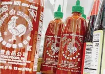  ?? Justin Sullivan/Getty Images ?? A shortage of red jalapeño chiles caused by climate change in Mexico has made sriracha hot sauce hard to find.
