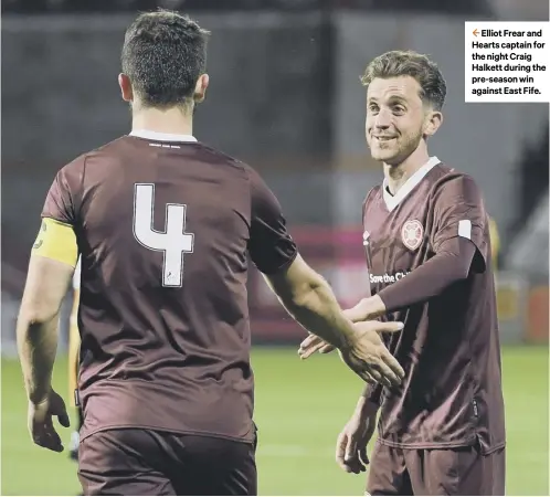  ??  ?? 2 Elliot Frear and Hearts captain for the night Craig Halkett during the pre-season win against East Fife.