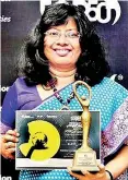  ??  ?? SLSI DIRECTOR GENERAL SIDDHIKA: Shows Gold Award for Inspiratio­n Women of the Year but looks askance at poison food in markets to help local traders