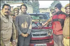  ?? PTI FILE ?? Golfer Jyoti Randhawa (2nd from left) arrested on charges of poaching in the Dudhwa Tiger Reserve on Wednesday.