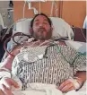  ?? PHOTO PROVIDED ?? Greg Borden, 40, of Enon, rests in a bed at Ohio State University’s Wexner Medical Center after receiving a double-lung transplant.