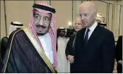  ?? HASSAN AMMAR — THE ASSOCIATED PRESS ?? Then-Vice President Joe Biden, right, offers his condolence­s to then Prince Salman bin Abdel-Aziz upon the death of his brother Saudi Crown Prince Sultan bin Abdul-Aziz Al Saud at Prince Sultan palace in Riyadh, Saudi Arabia. President Joe Biden is expected to speak to Saudi King Salman for the first time in Biden’s just over a month-old administra­tion.