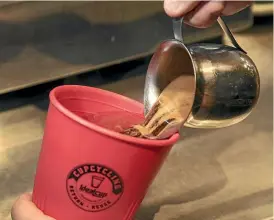  ?? KEVIN STENT/STUFF ?? Kanteen, a cafe in the NZ Post building in Wellington, has devised a cupcycling scheme by which the cups are taken back at the end of each day and reused time and again.