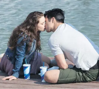  ?? NETFLIX ?? Katherine Langford and Ross Butler in 13 Reasons Why. The series has stirred up controvers­y for both its seasons, which cover such difficult topics as sexual assault, school shootings and bullying.