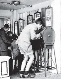  ?? PHOTO: GETTY IMAGES ?? What the butler saw . . . The machines were common at seaside amusement arcades in the 1900s.