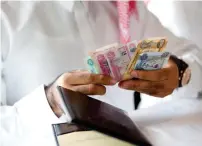  ?? — FILE PHOTO ?? Net profits for Dubai-listed companies surged by 32.8 per cent yearon-year to $4.1 billion in third quarter 2022 from $3.1 billion in the same 2021 period.