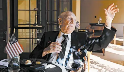  ?? AL SEIB/TNS ?? Eldon Knuth, 95, waves Tuesday during a Bronze Star ceremony at a California nursing home. Attendance was limited due to the pandemic.