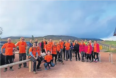  ?? ?? Peak performers
The group of 23 walkers and two cyclists took part in the “Scottish three peaks challenge”