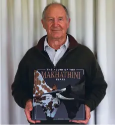  ?? ?? Ed Schroeder with a copy of his book, The Nguni of the Makhathini Flats.