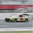  ?? MATT KELLEY, THE ASSOCIATED PRESS ?? Ryan Blaney and his No. 12 car held off William Byron to win the Coca-Cola 600 at Charlotte Motor Speedway on Monday in Concord, North Carolina.