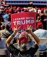  ?? Josie Norris/Staff photograph­er ?? A Trump supporter attends the rally for the former president at Waco Regional Airport on Saturday.