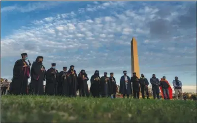  ?? (AP/Gemunu Amarasingh­e) ?? Faith leaders gather to conduct an event Nov. 4 in Washington to commemorat­e Tigray people killed in Ethiopian government attacks in Tigray, the northernmo­st region in Ethiopia.