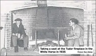  ?? Picture: Rory Kehoe ?? Taking a seat at the Tudor fireplace in the White Horse in 1935