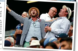  ??  ?? England’s supporters celebrate in the stands during semi-final yesterday