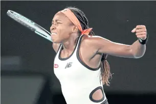  ?? AFP ?? Coco Gauff of the US reacts after defeating Emma Raducanu of Britain in the second round.