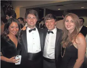  ??  ?? Michael Brennan, right, and Paul Stephens organized the Phoenix Club New Year’s Eve party. With them are Regan Sherwood, right, and Stephanie Stephens.