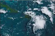  ?? NOAA — NESDIS — STAR GOES VIA AP ?? This satellite image provided by the National Oceanic and Atmospheri­c Administra­tion shows a Tropical Storm Fred in the Caribbean.