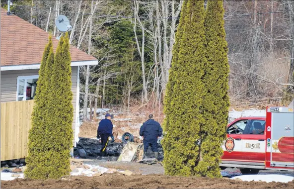  ?? COLIN CHISHOLM ?? On April 4, 2017, investigat­ors were still combing this South Rawdon Road property for clues after a suspicious fire on April 3 that claimed the life of a 27-year-old woman.