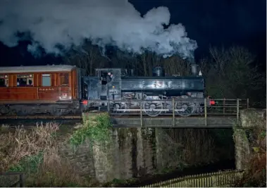  ?? ?? GWR pannier tank No. 7714 hauls the last train of the season away from Highley to Kiddermins­ter on January 3.