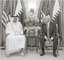  ?? New York Times file ?? President Donald Trump meets with Tamim bin Hamad alThani, the emir of Qatar, in May. Trump said he is backing Saudi Arabia and the United Arab Emirates in their feud with Qatar.