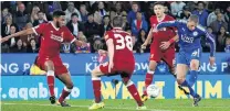  ?? PHOTO: REUTERS ?? Firepower . . . Islam Slimani (far right) strikes the ball to score Leicester City’s second goal against Liverpool in a League Cup thirdround game in Leicester yesterday.