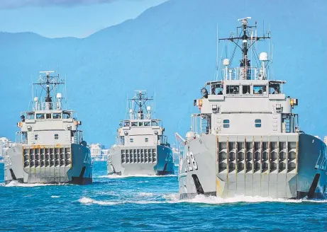  ?? ALL AT SEA: HMAS HMAS and HMAS depart Cairns Navy Base. ?? Brunei, Wewak Labuan