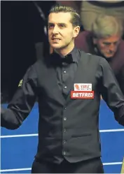  ??  ?? ■
Mark Selby celebrates his victory.