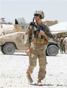  ?? — Reuters ?? A US soldier keeps watch at an Afghan National Army base in Logar province.