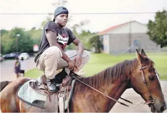  ?? Cinema Guild Cinema Guild ?? WILLIE rides a horse in “Hale County This Morning, This Evening,” a look at a rural Alabama community where director RaMell Ross coached basketball.