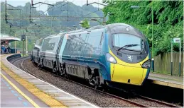  ??  ?? During its record attempt journey from London Euston to Glasgow 390044 Royal speeds through Berkhamste­d on June 17, 2021. Noel Slack