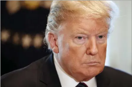  ?? JACQUELYN MARTIN — THE ASSOCIATED PRESS ?? President Donald Trump attends a discussion on border security with local leaders on Friday in the Cabinet Room of the White House.