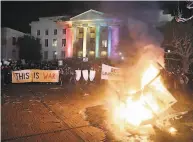  ?? Scott Strazzante / The Chronicle 2017 ?? Protesters demonstrat­e against a planned speech by Milo Yiannopoul­os at UC Berkeley in February 2017.
