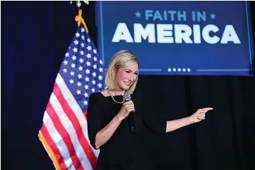  ?? Associated Press ?? ■White House faith adviser Paula White-Cain speaks July 23 during an Evangelica­ls for Trump campaign event titled "Praise, Prayer and Patriotism" in Alpharetta, Ga. President Donald Trump’s re-election campaign is courting religious voters in part by seeking to portray Democrats as a threat to religious freedom — a pitch amplified by disputes over the issue during the coronaviru­s pandemic.