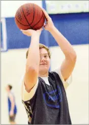  ?? WILLIAM HARVEY/RIVER VALLEY & OZARK EDITION ?? Greenbrier senior Tanner Tilley attempts a free throw during preseason drils.