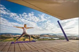  ??  ?? The Commonage at Predator Ridge features the resort community’s third outdoor yoga platform.