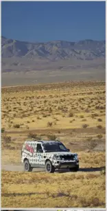  ??  ?? TOP RIGHT: Karen Hoehn and Dana Saxten,Team 108, cross the terrain in a ’14 Land Rover LR4.